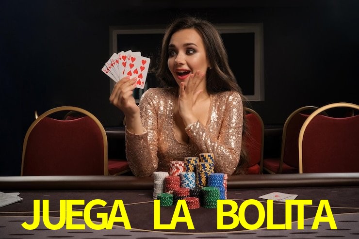 Una escena digital vívida inspirada en casino con JUEGA LA BOLITA mostrado prominentemente, luces brillantes, fichas, cartas y acentos dorados.